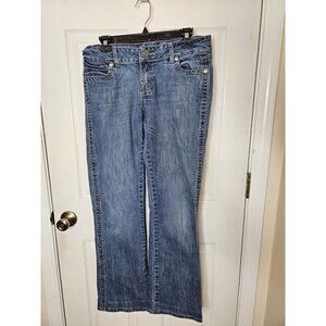 Wrangler Premium Patch Womens 9/10x31 Mid Rise Bootcut Jean Meduim Wash HEMD